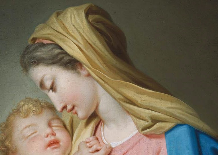 The soft folds and warm color create a halo-like effect, highlighting her divine status.