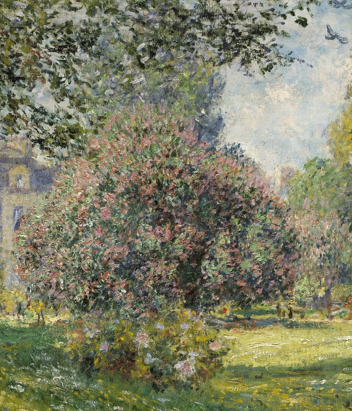 The compositional anchor; Monet's loose impasto captures spring blossoms dissolving into light rather than hard botanical form