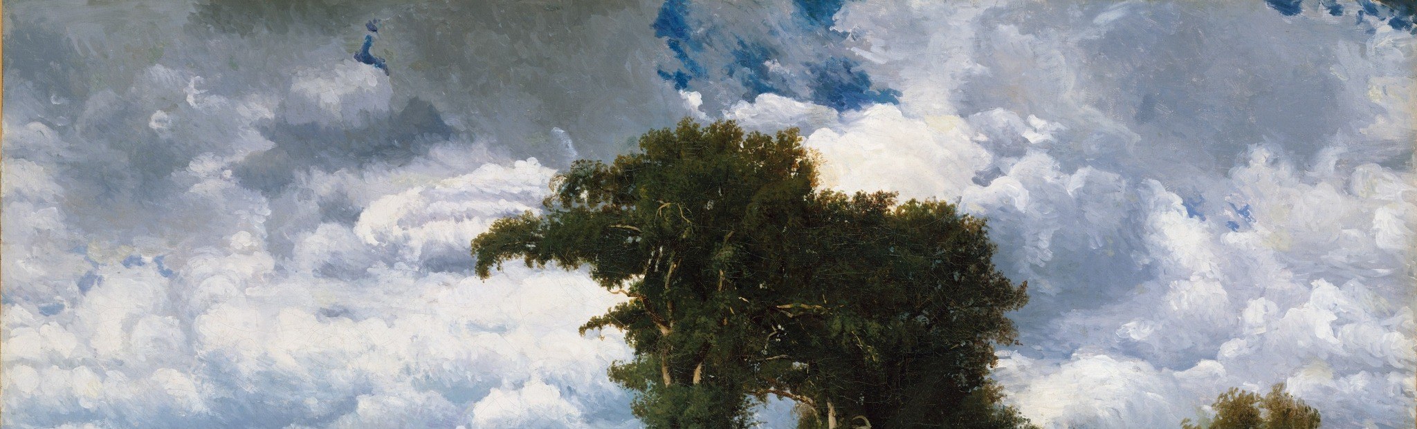 Or the heavy, dramatic clouds that fill the sky above the fields.