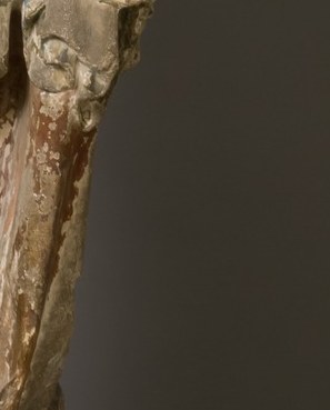Look closely: that's the raw wood beneath the paint.