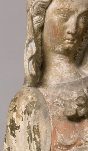 Her calm expression conveys maternal tenderness and a sense of divine peace.