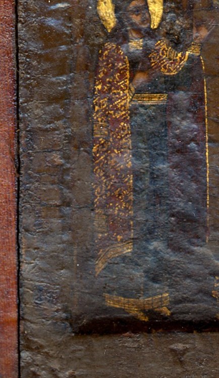 Their robes still carry Byzantine gold, stamped into the wood.