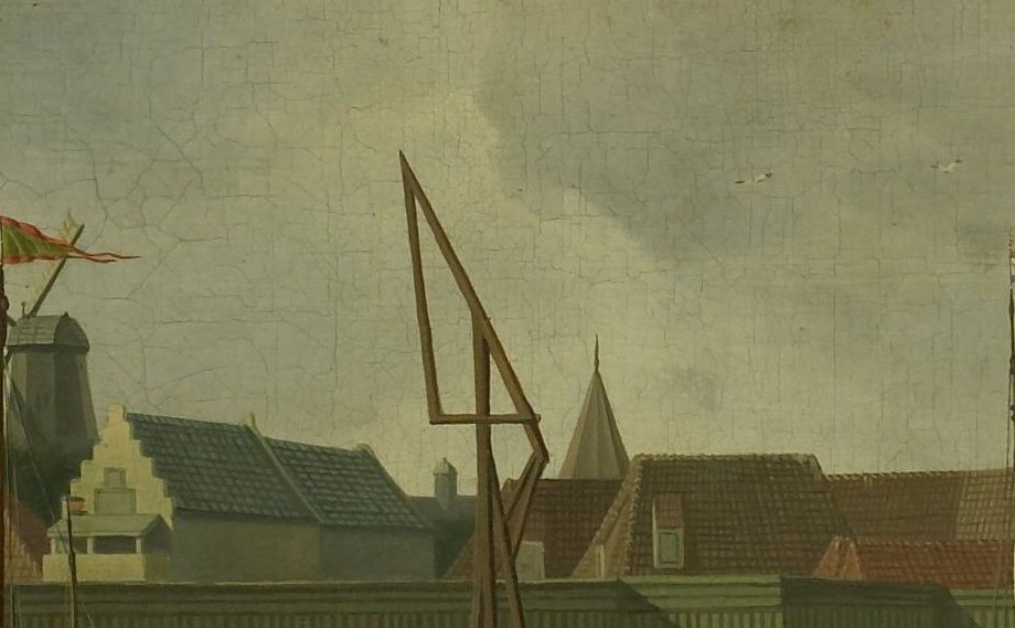 Cranes on the dock show the constant work of a bustling port.