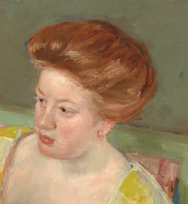 Her expression combines alertness and tenderness , the subtle downward tilt anchors the entire emotional gravity of the scene.
