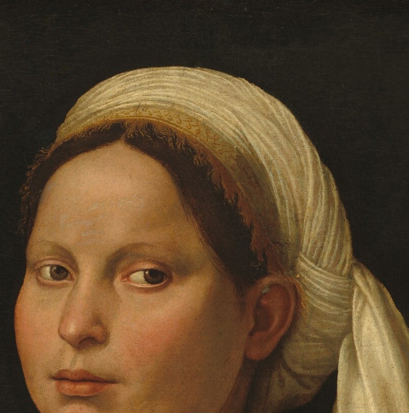 Unusual headwear for Italian female portraiture of this period , the turban may signal specific Florentine fashion of the 1520s or a domestic/clerical social status worth researching.