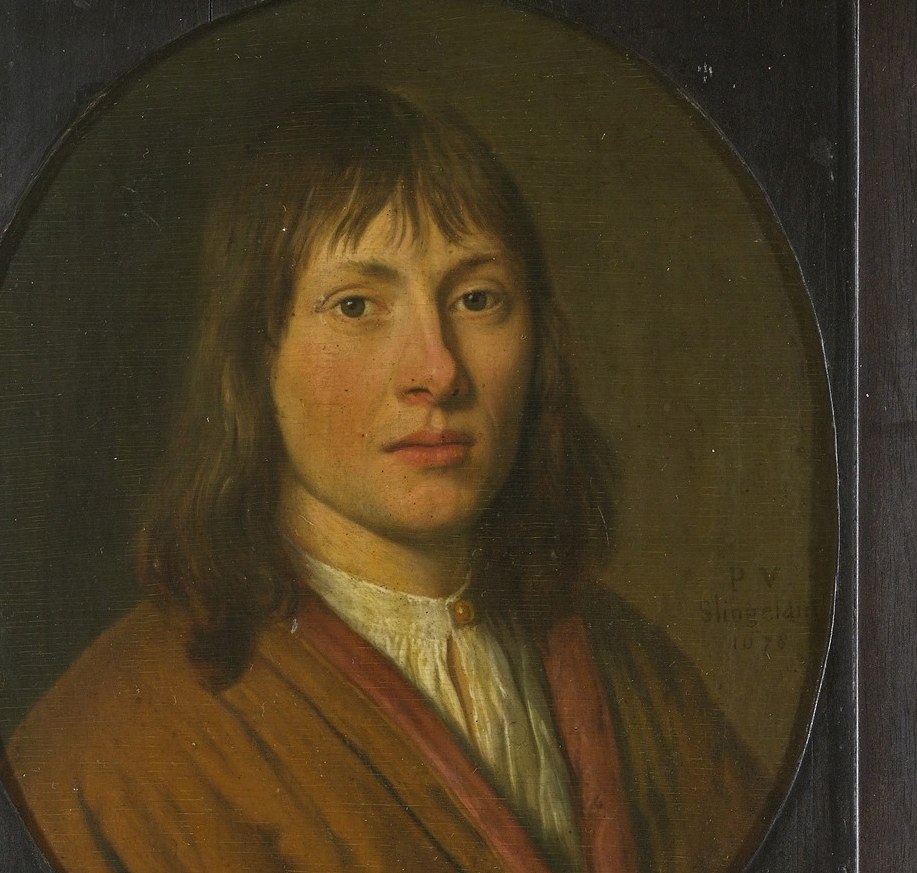 His direct gaze and slightly parted lips suggest a moment of contemplation or subtle engagement with the viewer.