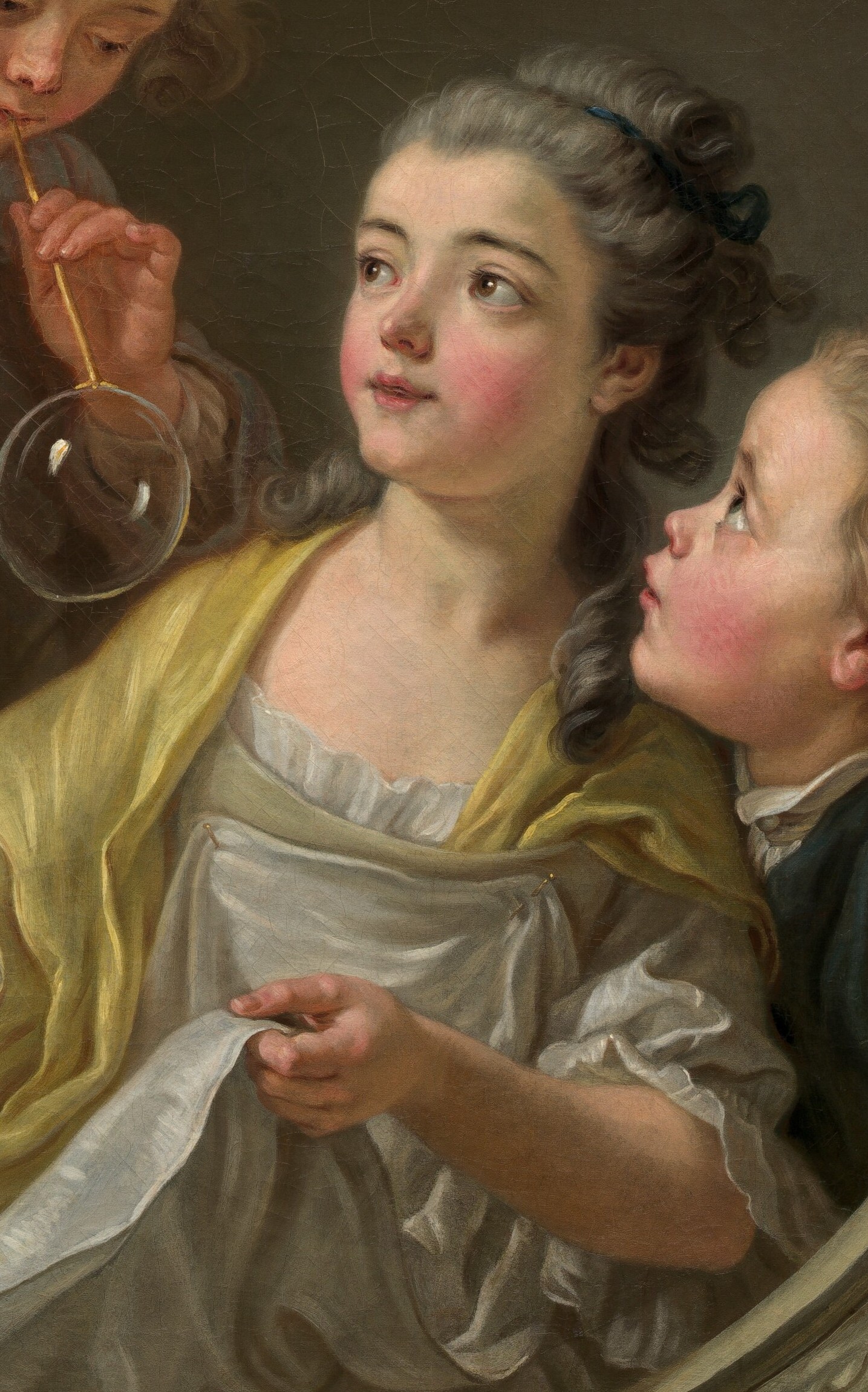 The children's expressions show pure, innocent wonder.