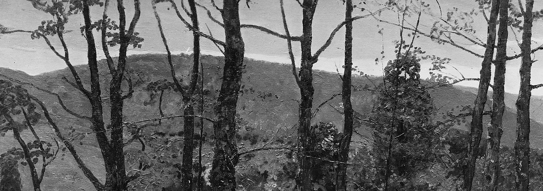 That haze softens the mountain. It is not mist he painted, it is distance.