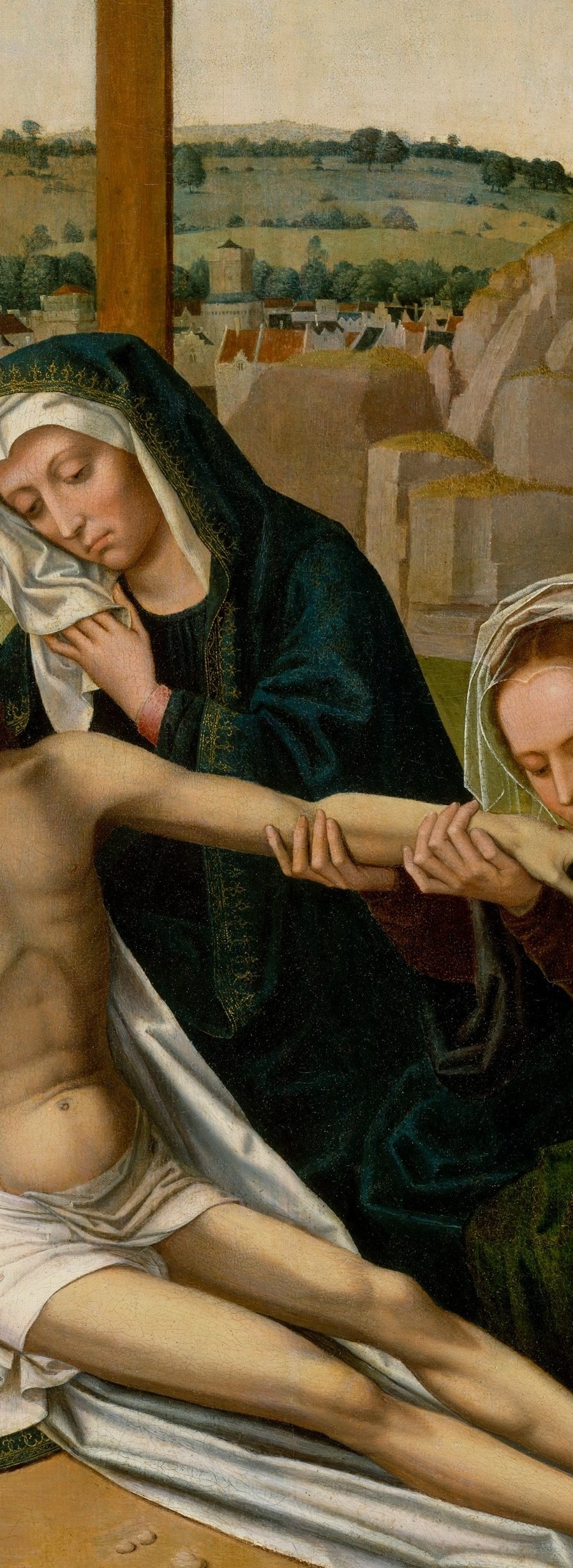 Her bent head and the careful grip on Christ's hand is one of the painting's most intimate touches , a moment of refusal to let go.