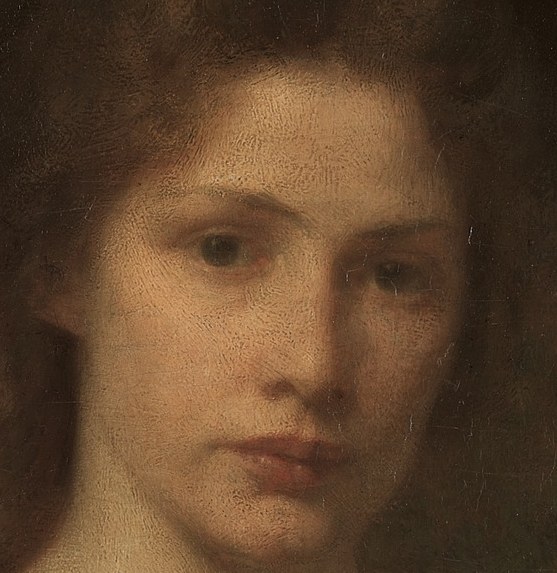 The dark hair frames her face, emphasizing her features and adding to the somber mood.