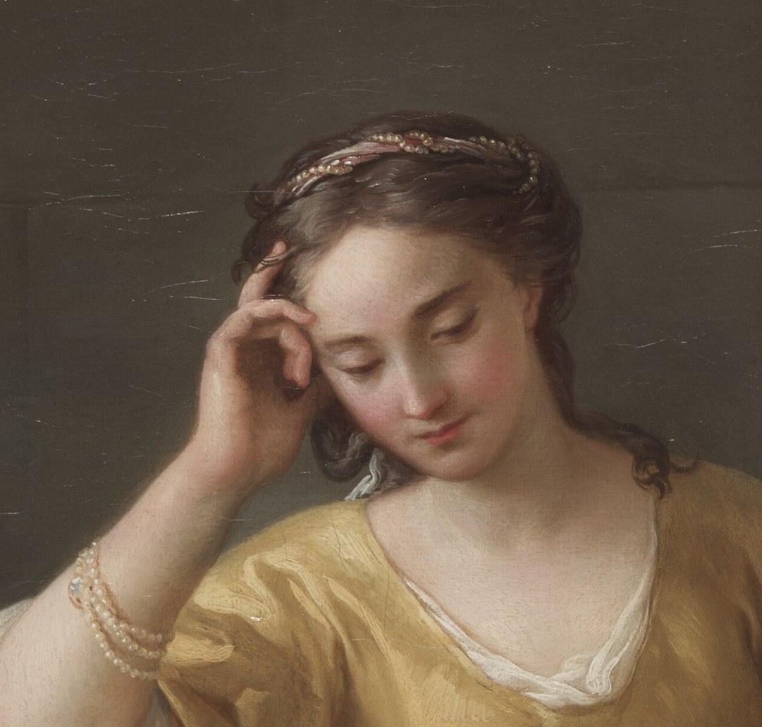 It shows a quiet, contemplative mood, not overt drama.