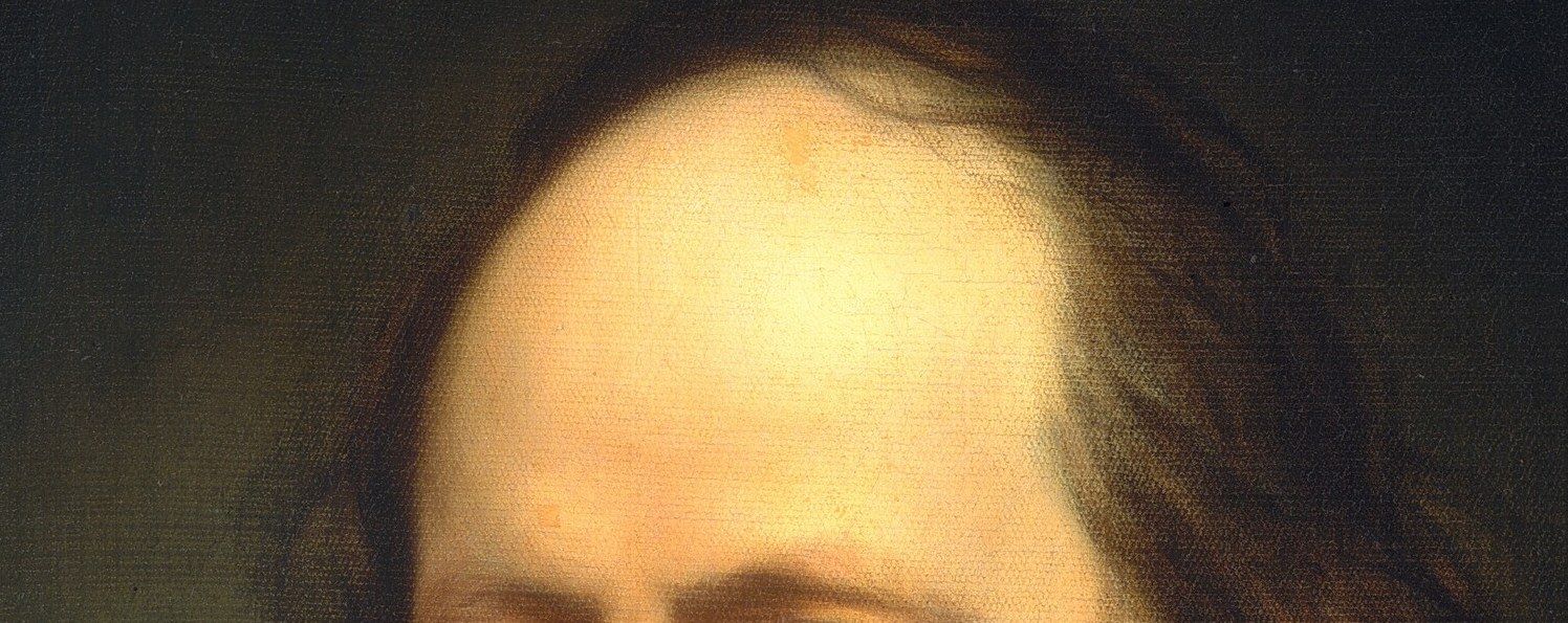 His forehead furrows, a record of a life lived.