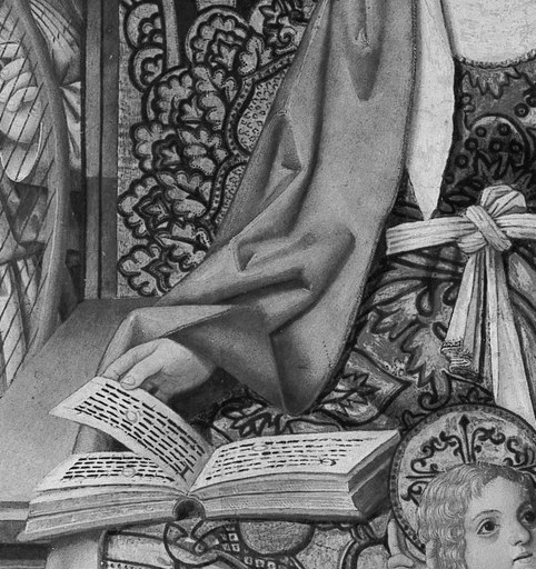 Mary reads. Her bowed head models contemplative piety.