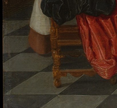Look lower left. A dog curls on the tile floor.