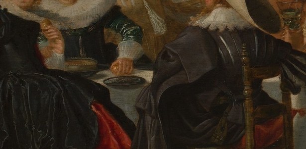 The tall wine glasses are a costly prop, not a casual drink.