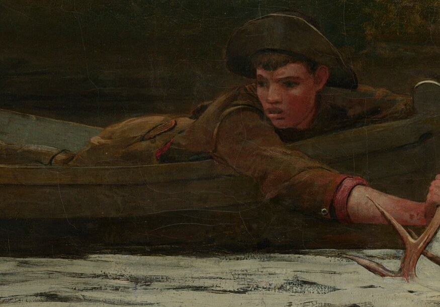 This hunter is illuminated by stark, dramatic moonlight.