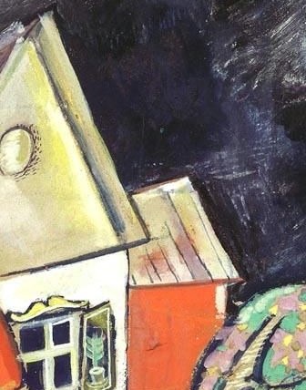 A couple holds each other in the doorway.
