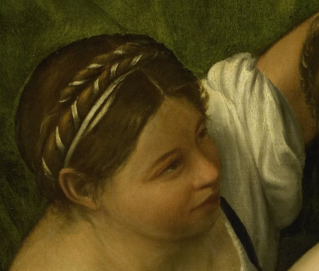 The maidservant carries Holofernes' head, wrapped in cloth.