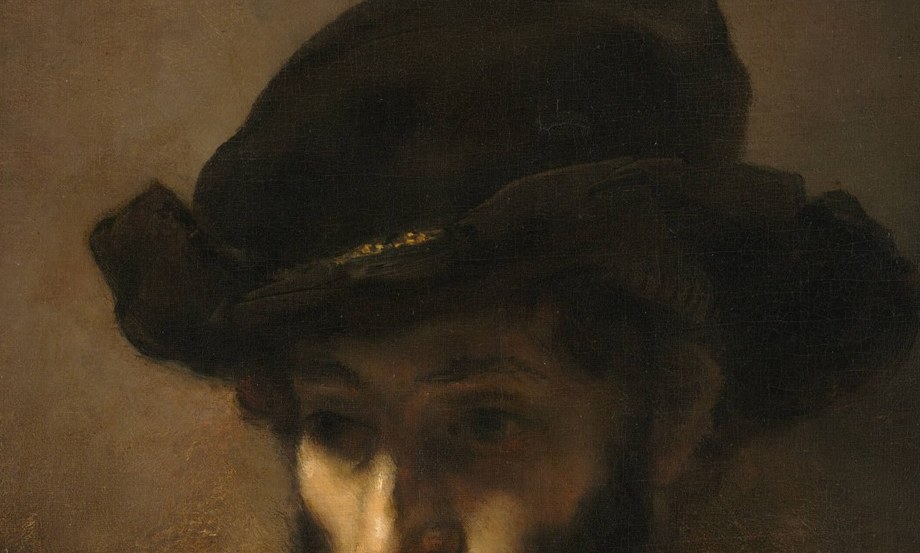 The hat obscures his upper face.
