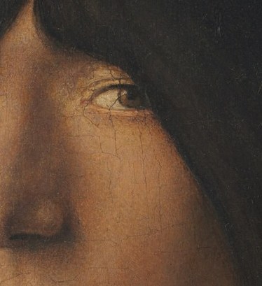 His intense eyes seem to hold a quiet challenge.