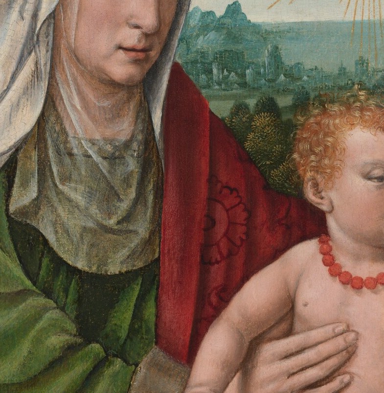 Her weary expression conveys a sense of maternal wisdom and perhaps a hint of melancholy.