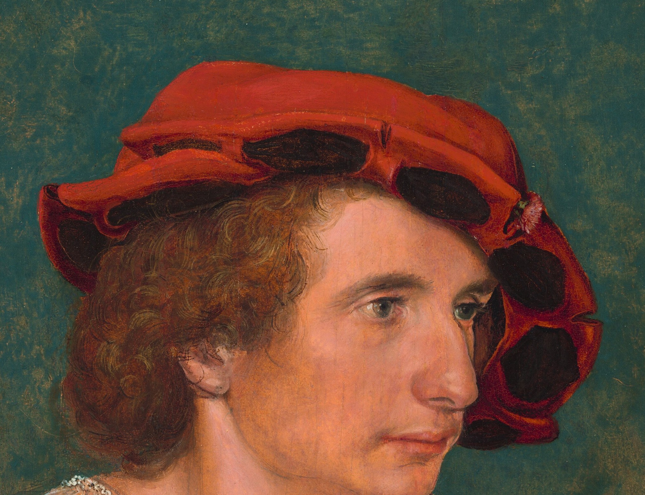 His red hat signifies rank or profession.