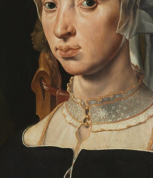 Her face looks directly at you.