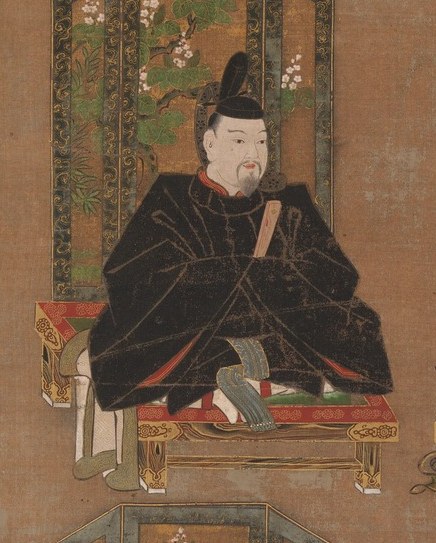 His stern expression and formal attire suggest authority and solemnity.