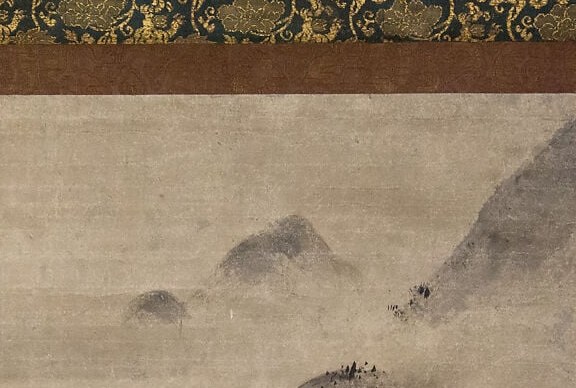 The mountain peaks dissolve in wet-on-wet washes, while the silk below stays untouched.