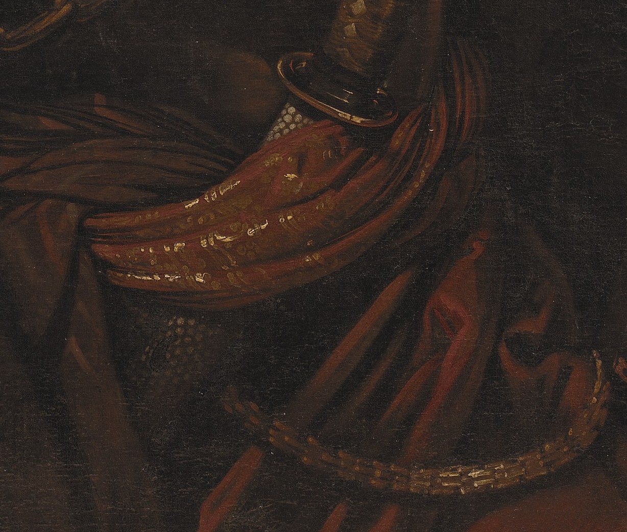 A red sash signals rank.