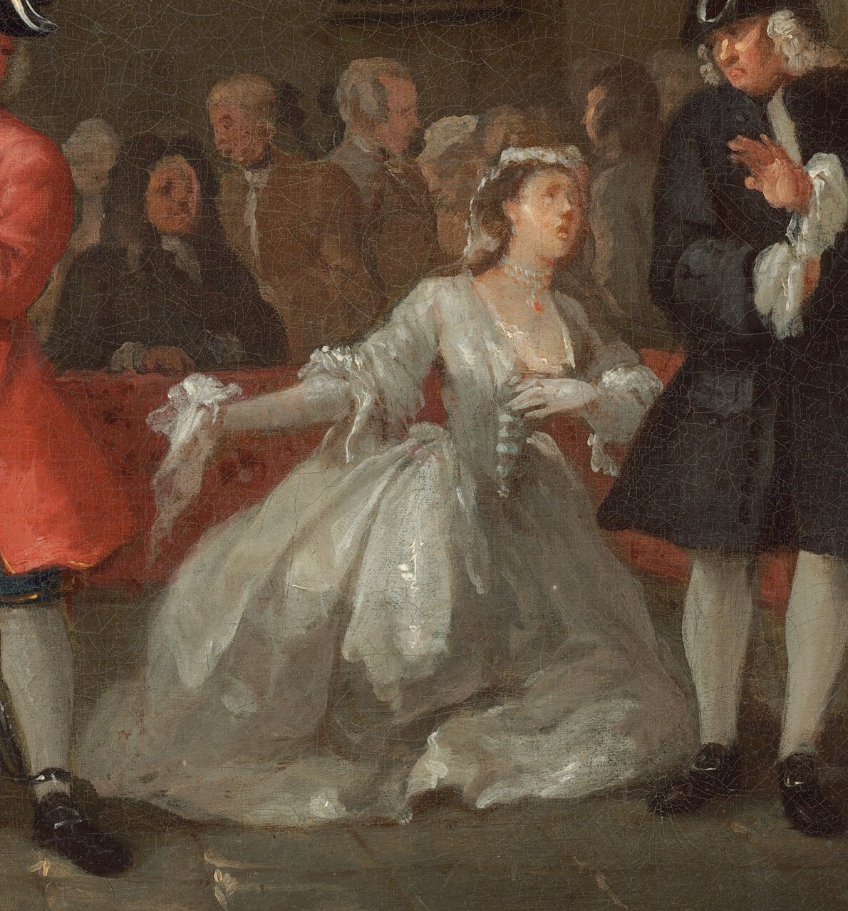 Her posture and expression convey a sense of supplication or distress, drawing the viewer's empathy.