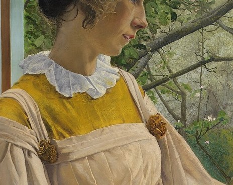 Her calm expression and modest stance convey an intimate atmosphere.
