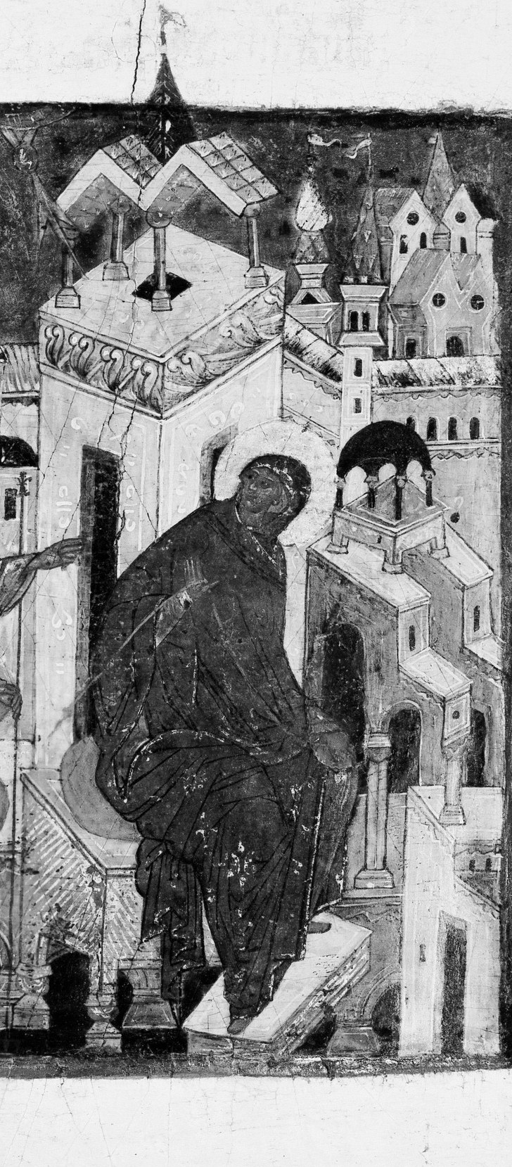 And Mary receives it in the dark maphorion of humility.
