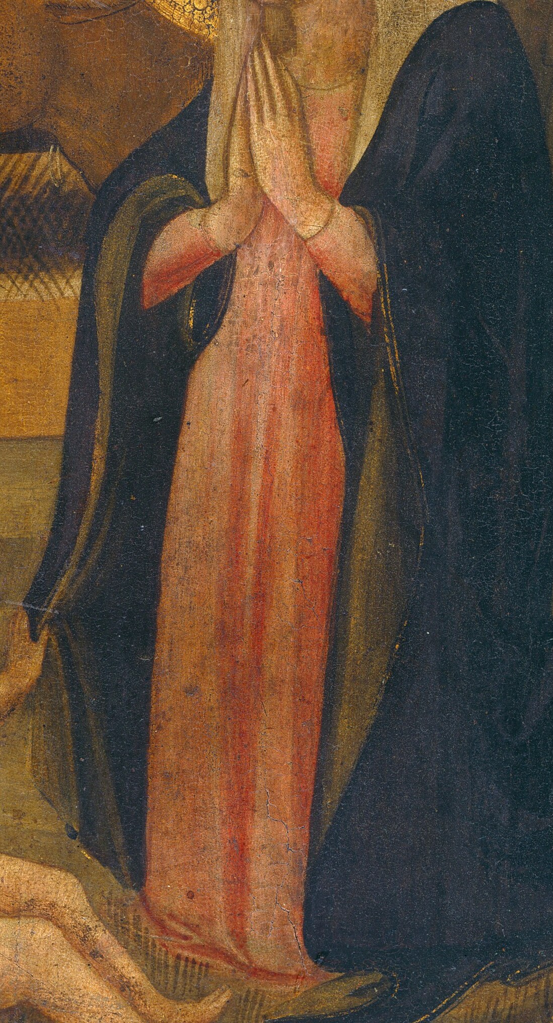 Look at the Virgin Mary, bowed in prayer.