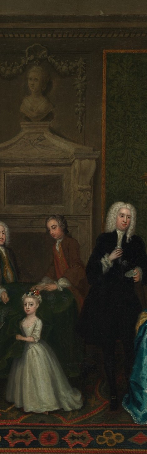 The dominant vertical axis of the whole composition; his white wig and formal stance signal paternal authority , every other figure orients toward or away from him
