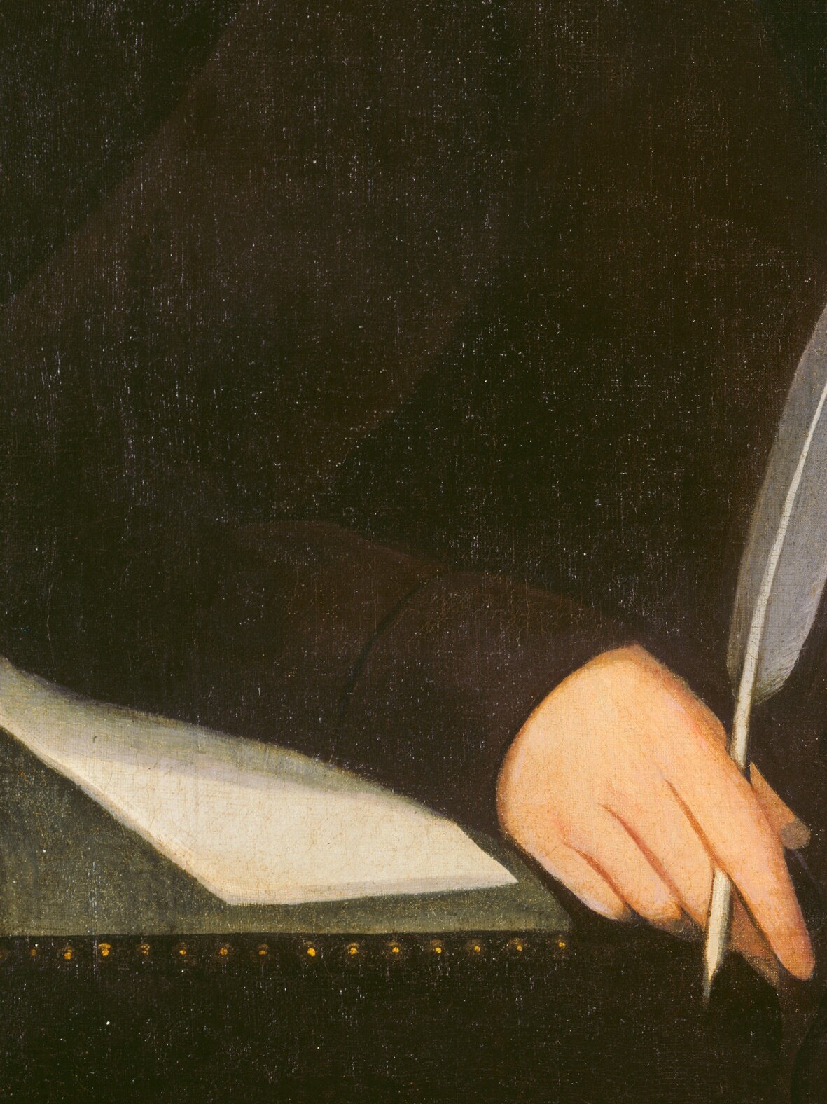 The papers in his left hand suggest a man of business or law.