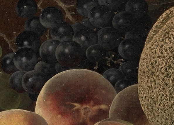 The deep, almost black color and plumpness of the grapes suggest a rich, juicy flavor.