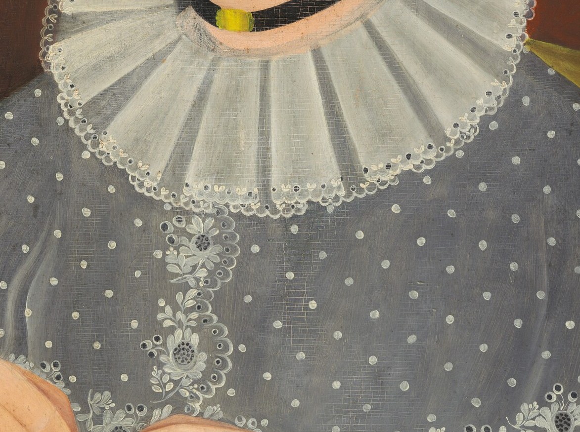 But look closely at her ruffled collar and elegant shawl.
