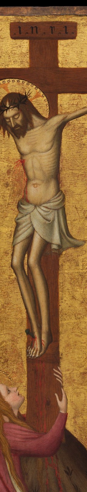 The simple brown wood of the cross reads as starkly material against the otherworldly gold , the collision of earthly death and divine light.