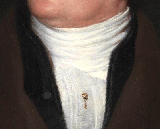 But look closely at his cravat, by his neck.