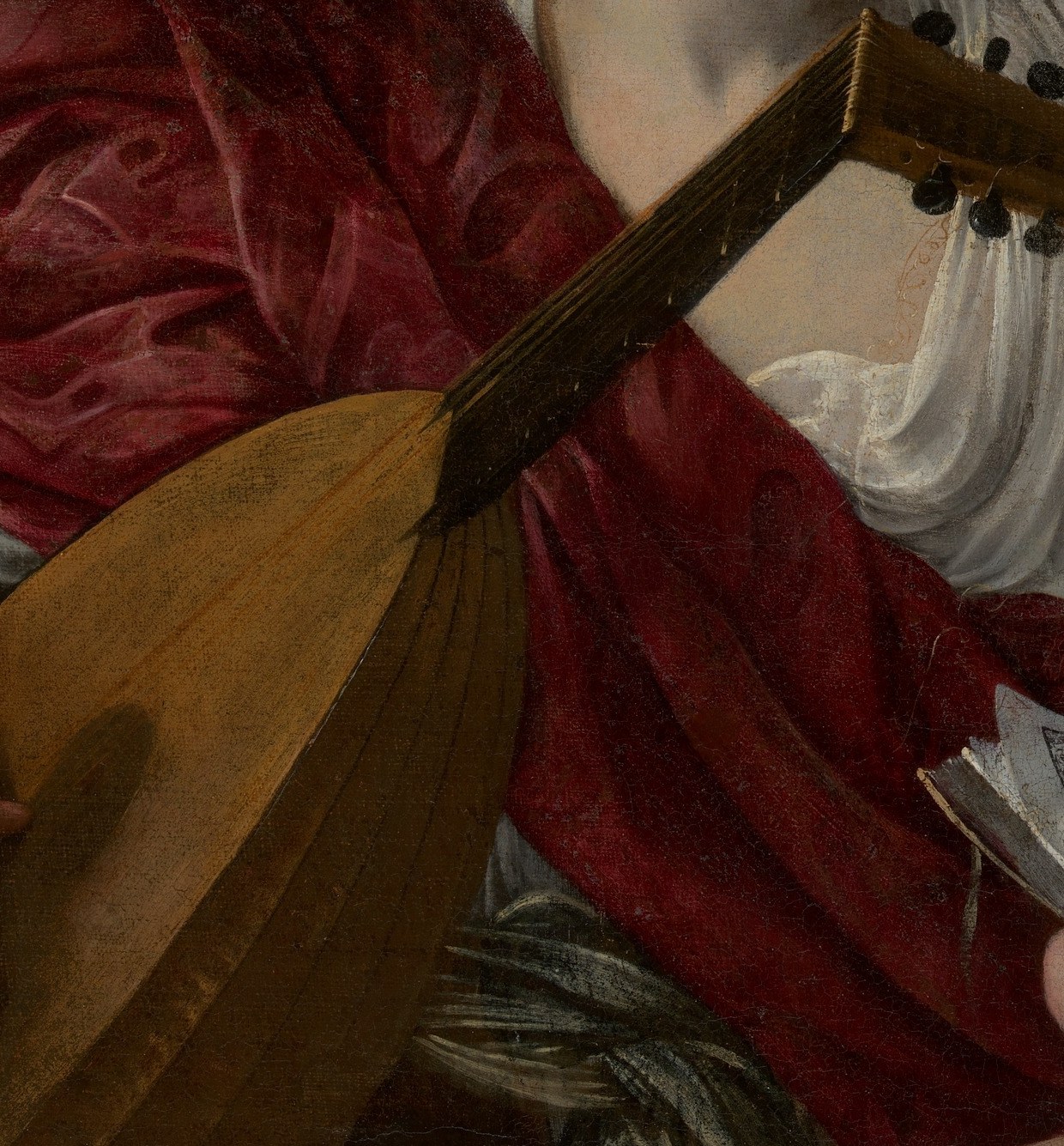 Rendered with olive undertones lit from a single high source , an early demonstration of Caravaggio's chiaroscuro applied to skin texture rather than drapery, predicting his mature style.