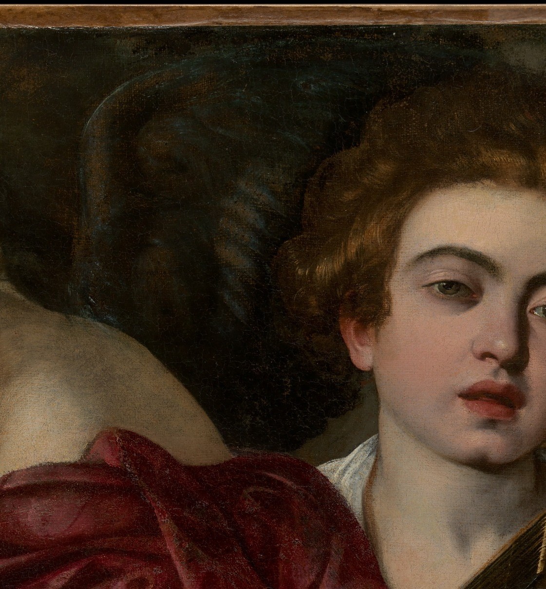 Often read as a self-portrait of Caravaggio; the moist, slightly unfocused eyes and open mouth suggest mid-performance emotion , one of his most psychologically direct early faces.