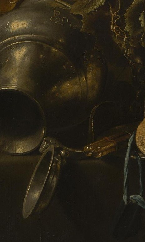 Look at the overturned pewter jug.