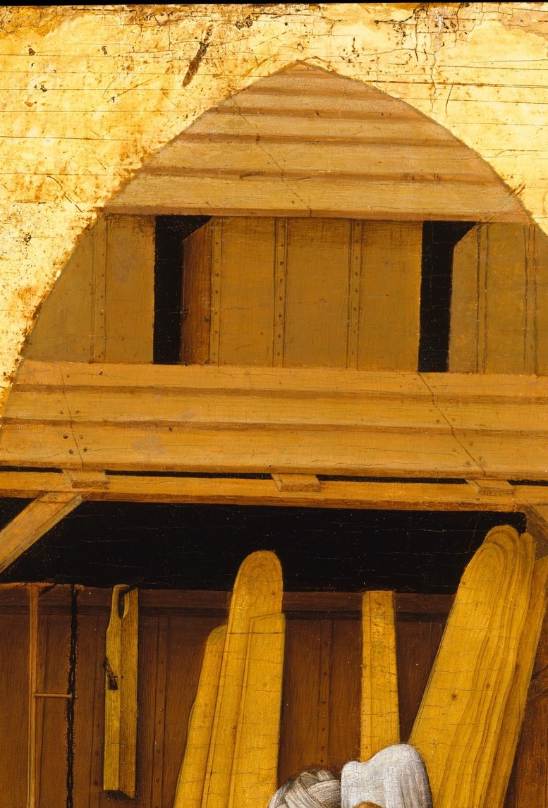 The saint's halo and the golden arch are the same gold.