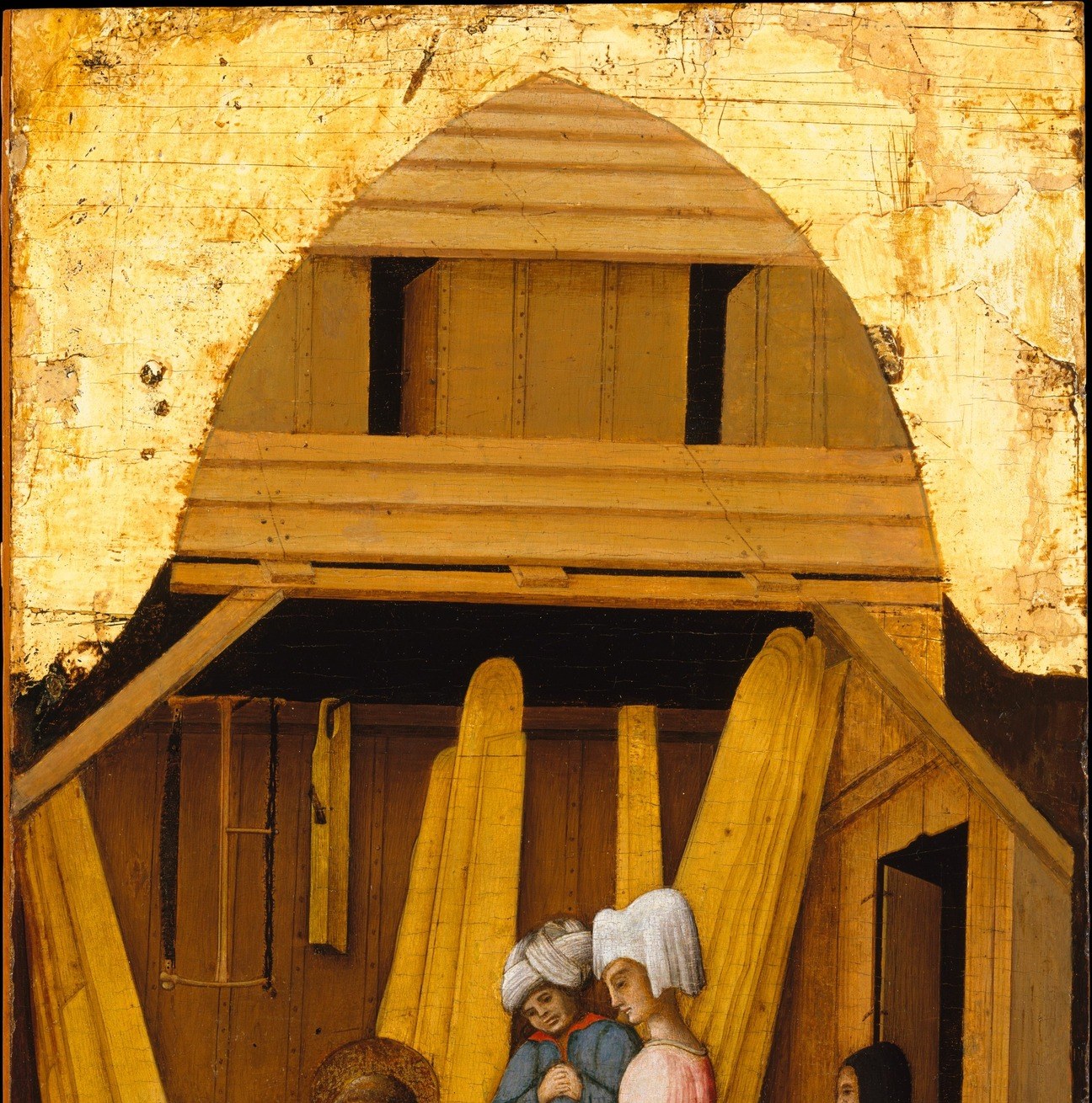 The setting is a poor wooden room, not a church.