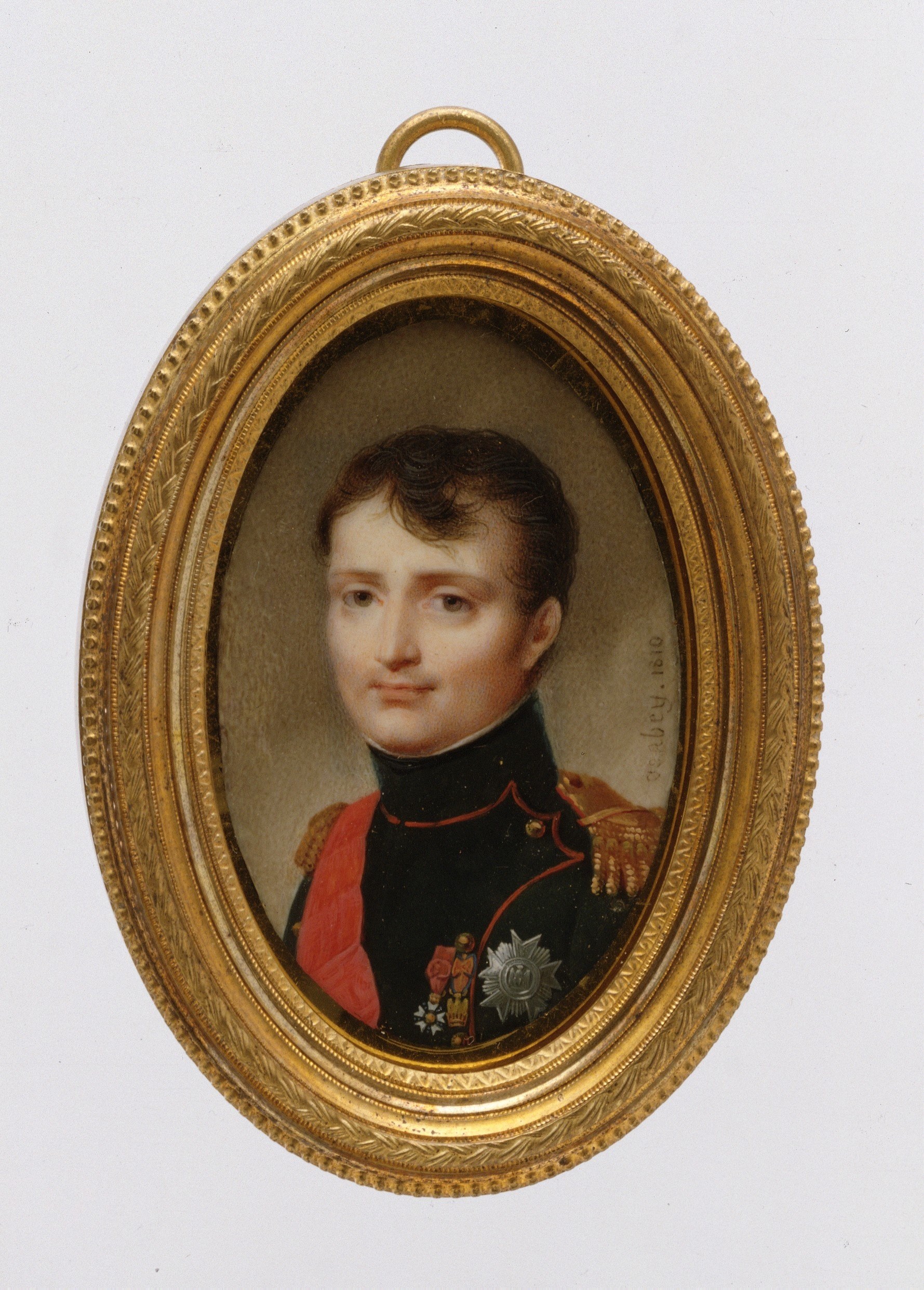 The frame is integral to the object , a luxury portrait-miniature case. The rope-and-bead motif echoes Empire-style neoclassical ornament and signals this was a diplomatic or personal gift object.