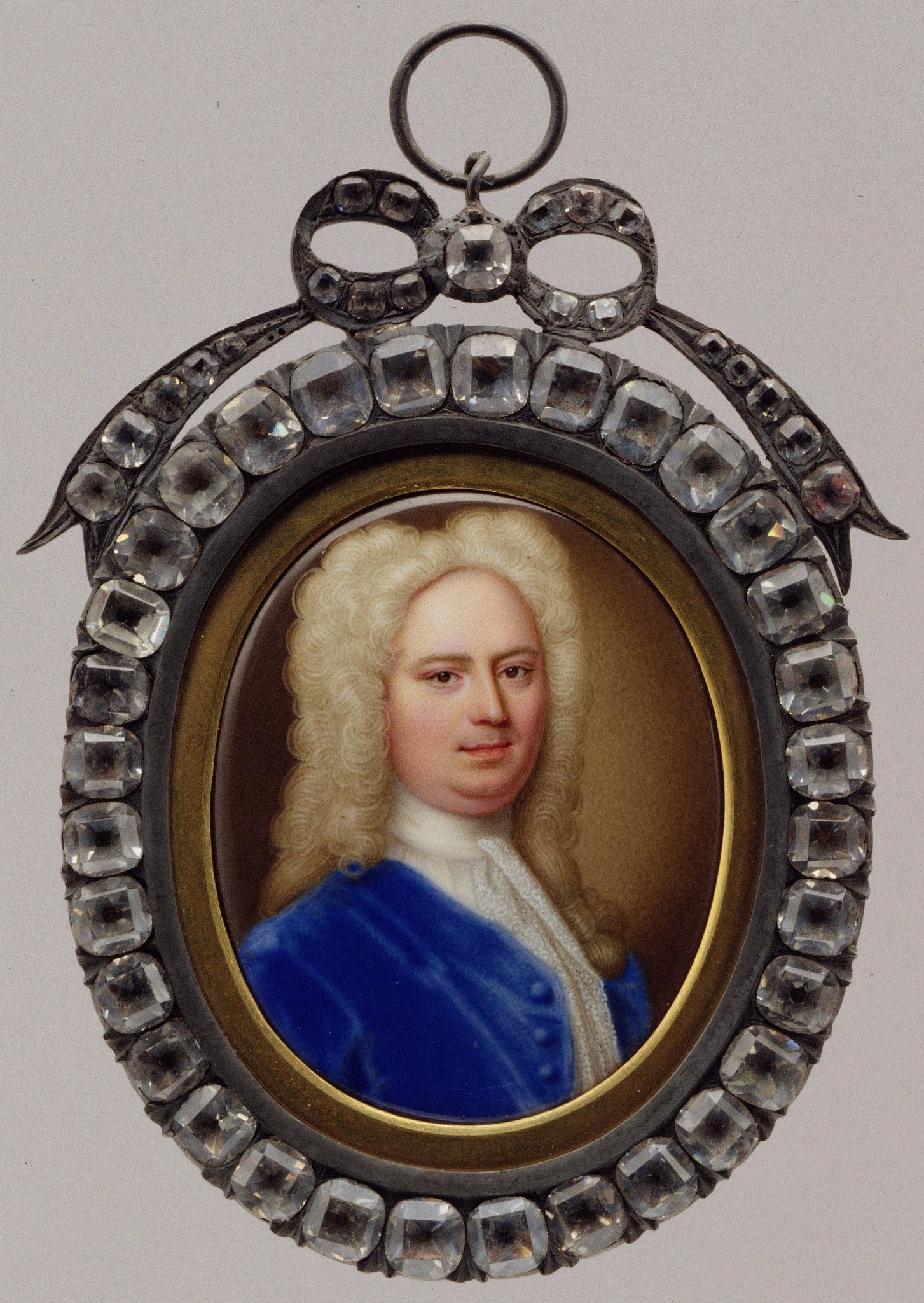 The painting itself is set in a diamond-encrusted frame.