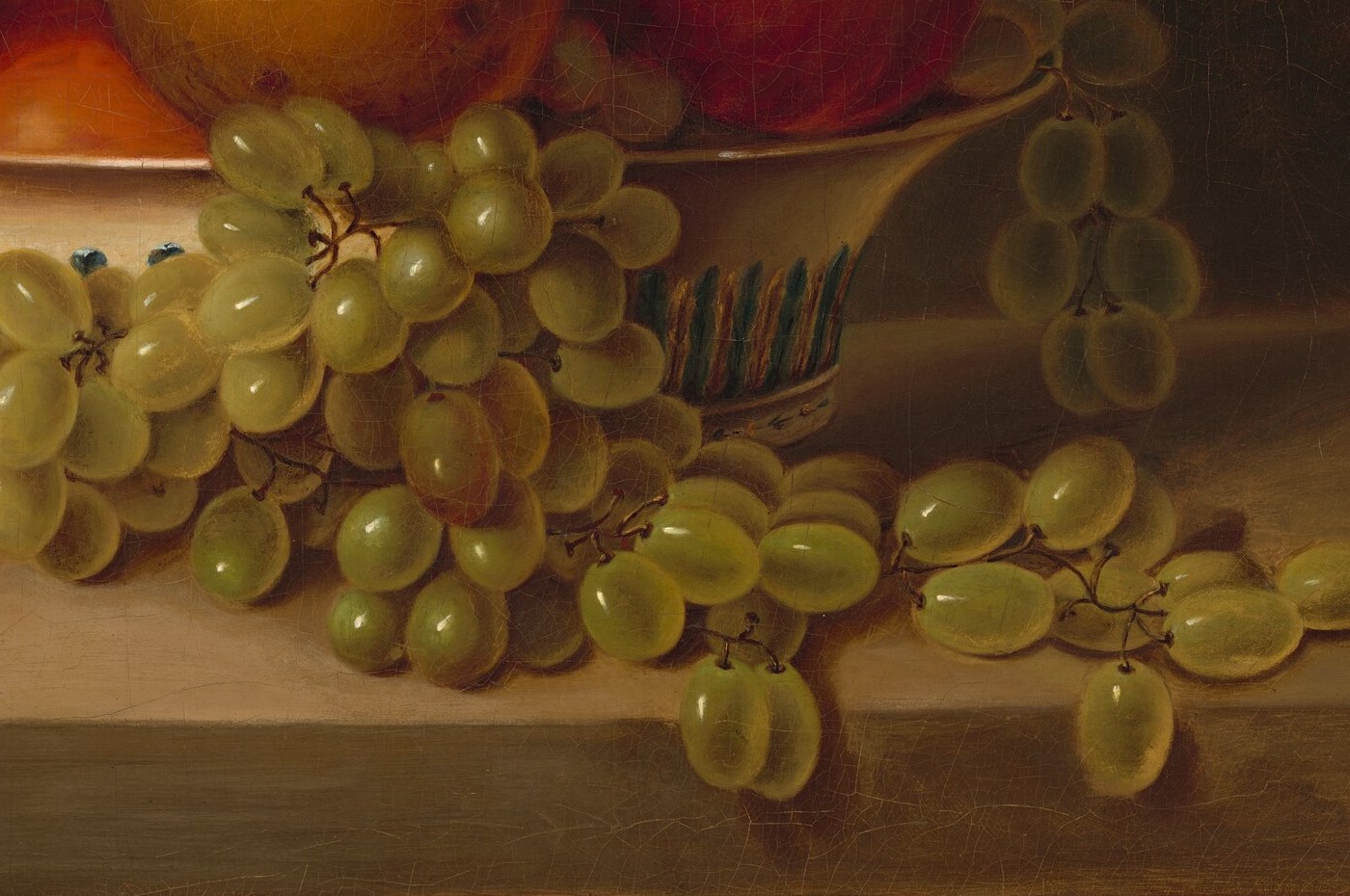 The translucent quality of the grapes, with light shining through them, suggests ripeness and abundance.