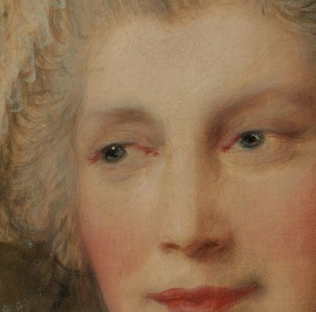 Now drop your eyes to the soft pink on her cheeks.