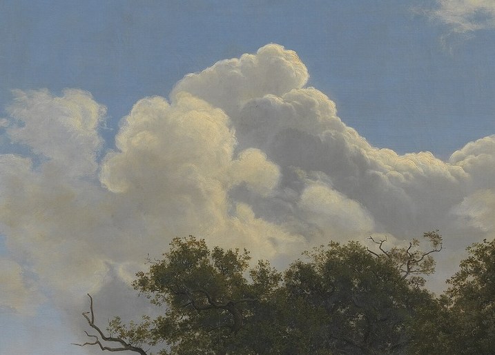 The interplay of light and shadow on the clouds creates a sense of depth and atmospheric drama, hinting at changing weather.